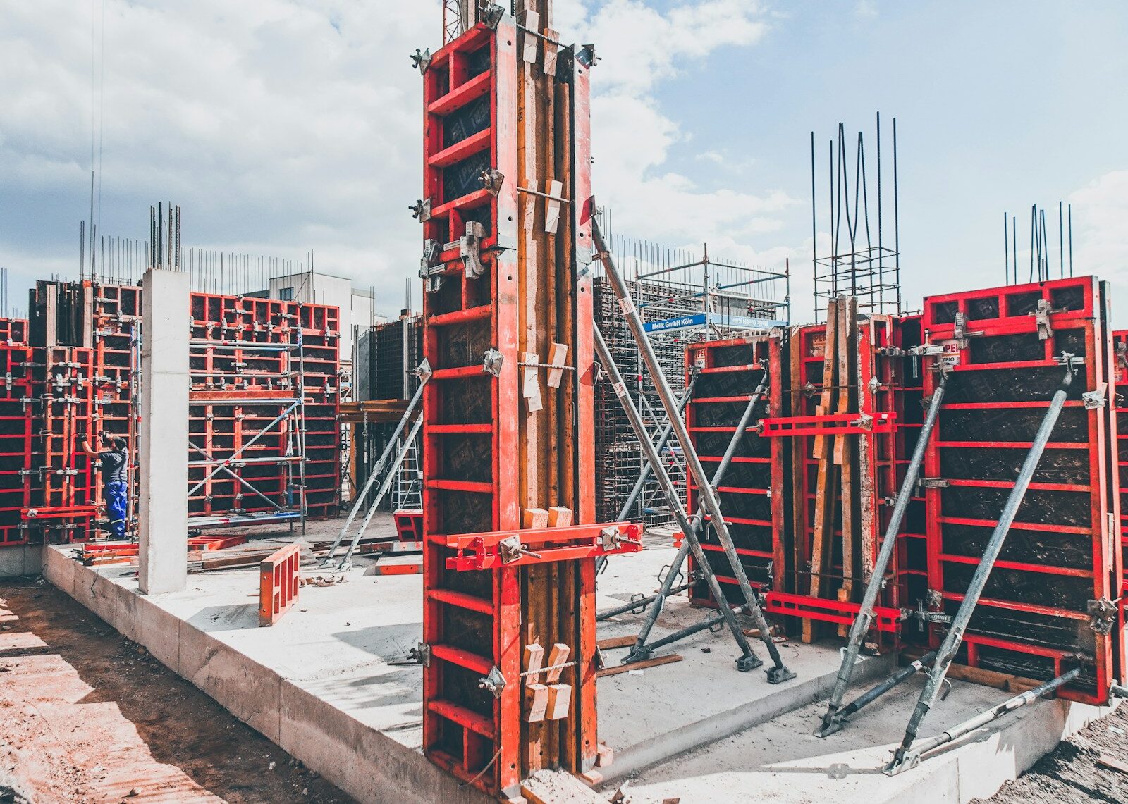 red metal structure with beam